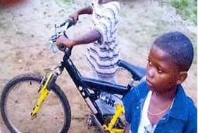 Liberian children with bike