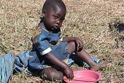 Malawi girl with her food dish