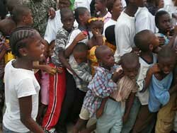 Children push toward head of food line