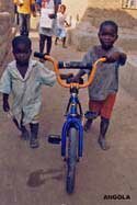 Little boys with an undreamed luxury - a bike